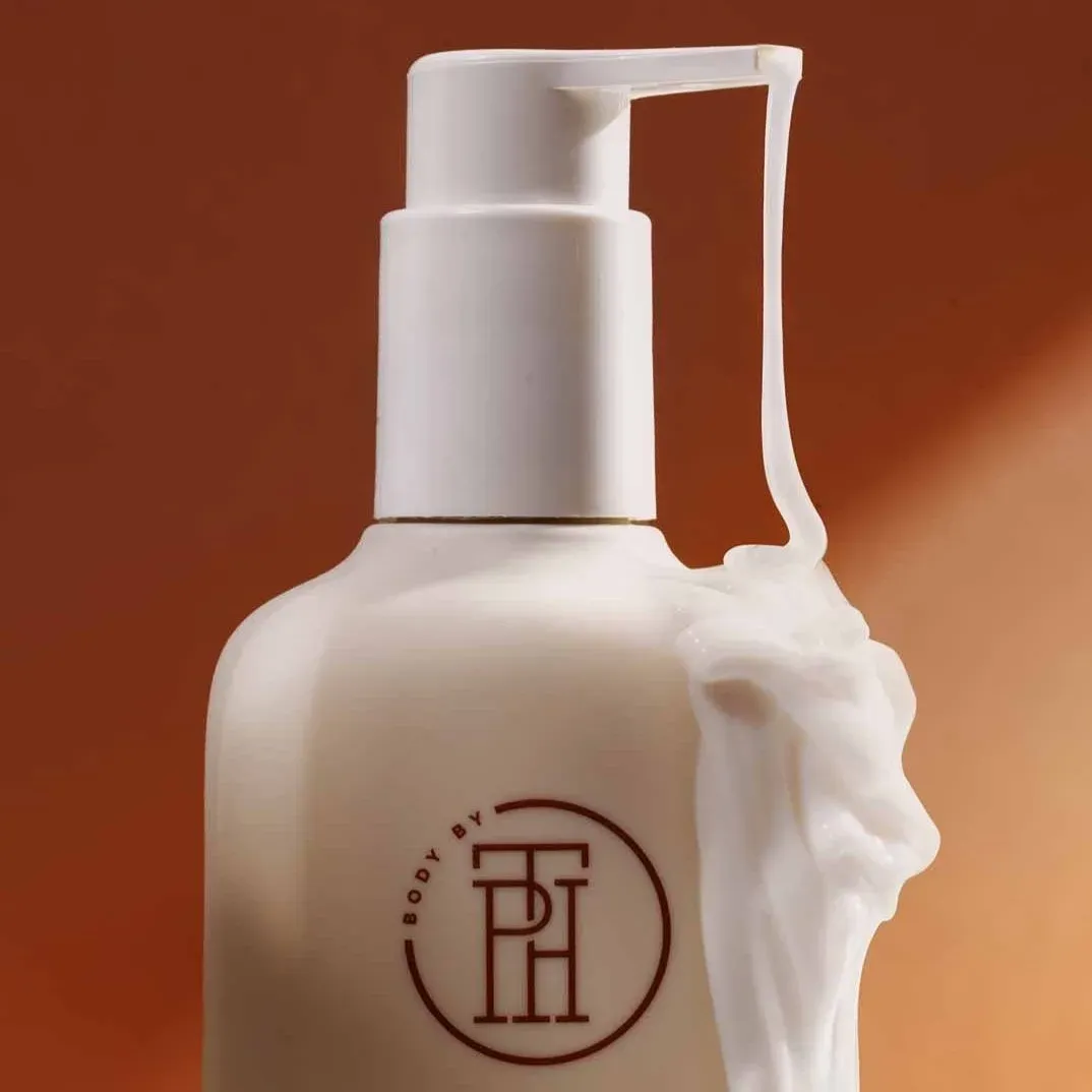 TPH pump bottle with lotion dripping down the side