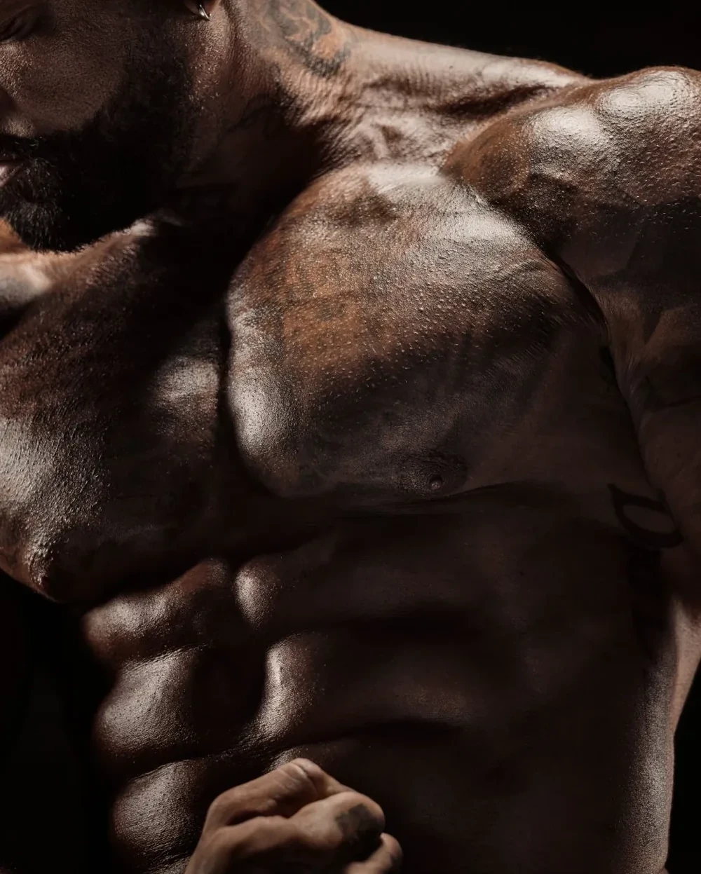 Chest target: close crop of Shaun T’s chest